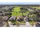 Aerial view of homes with a golf course at 31330 Spoonflower Way, Brooksville, FL 34602