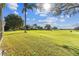 Spacious backyard overlooking a golf course at 31330 Spoonflower Way, Brooksville, FL 34602