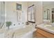 Relaxing bathroom with soaking tub, shower, and updated vanity at 31330 Spoonflower Way, Brooksville, FL 34602