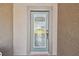 Front entry door with decorative glass panes at 31330 Spoonflower Way, Brooksville, FL 34602