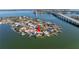 Bird's-eye view of waterfront home and neighborhood at 3624 Belle Vista E Dr, St Pete Beach, FL 33706