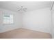 Spacious bedroom with carpet and ceiling fan at 4404 W Azeele St, Tampa, FL 33609