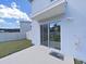 Private backyard with patio and fenced-in lawn at 5018 Bella Armonia Cir, Wimauma, FL 33598