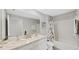 Bathroom with double vanity and shower/tub combo at 5018 Bella Armonia Cir, Wimauma, FL 33598