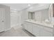 Bathroom with double vanity and shower at 5018 Bella Armonia Cir, Wimauma, FL 33598