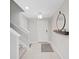 Bright entryway with tile floors and staircase at 5018 Bella Armonia Cir, Wimauma, FL 33598