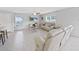 Relaxing living room with comfortable sofas and a large TV at 5018 Bella Armonia Cir, Wimauma, FL 33598