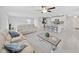 Open concept living room with neutral decor and recessed lighting at 5018 Bella Armonia Cir, Wimauma, FL 33598