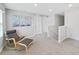 Spacious loft area with comfortable seating and natural light at 5018 Bella Armonia Cir, Wimauma, FL 33598