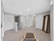Upstairs hallway with doors to bedrooms and full bathroom at 5018 Bella Armonia Cir, Wimauma, FL 33598