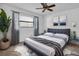 Spacious bedroom with a comfy bed, plush rug, and large window at 5435 20Th N Ave, St Petersburg, FL 33710