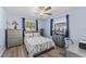 Cozy bedroom with floral bedding and plenty of closet space at 7494 132Nd Way, Seminole, FL 33776