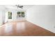 Bright living area with a large window and tiled floor at 8706 Cobbler Pl, Tampa, FL 33615