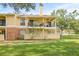 Exterior view of two story building with balcony at 8722 Mallard Reserve Dr # 204, Tampa, FL 33614