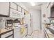 Well-equipped kitchen offering ample counter space and white cabinetry at 8722 Mallard Reserve Dr # 204, Tampa, FL 33614