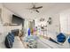 Living room with fireplace, light walls, and blue accents at 8722 Mallard Reserve Dr # 204, Tampa, FL 33614
