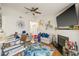 Living room with fireplace, sectional sofa, and hardwood floors at 8722 Mallard Reserve Dr # 204, Tampa, FL 33614