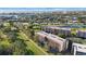 Aerial view of community near the water at 9433 Harbor Greens Way # 403, Seminole, FL 33776