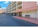 Building exterior with covered parking at 9433 Harbor Greens Way # 403, Seminole, FL 33776