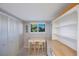 Small pantry area with white cabinets and butcher block counter at 9433 Harbor Greens Way # 403, Seminole, FL 33776