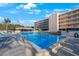 Relax by the refreshing community pool at 9433 Harbor Greens Way # 403, Seminole, FL 33776