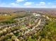 Aerial view showing home's location in a quiet neighborhood at 12610 Saulston Pl, Hudson, FL 34669