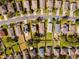 Aerial view showcasing the home's location in a residential neighborhood at 12610 Saulston Pl, Hudson, FL 34669