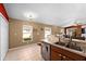 Modern kitchen with stainless steel appliances and wood cabinets at 12610 Saulston Pl, Hudson, FL 34669