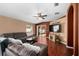 Spacious living room with hardwood floors, sectional sofa, and fireplace at 12610 Saulston Pl, Hudson, FL 34669