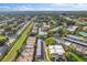 Wide aerial view showing the community's layout and surroundings at 1403 Cordova Grn, Seminole, FL 33777