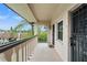 Private balcony with exterior access and lovely green views at 1403 Cordova Grn, Seminole, FL 33777