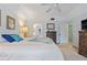 Primary bedroom with ensuite access and ample closet space at 1403 Cordova Grn, Seminole, FL 33777