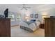 Spacious bedroom with a comfortable bed and plenty of natural light at 1403 Cordova Grn, Seminole, FL 33777