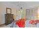 Bedroom with dresser and large closet at 1403 Cordova Grn, Seminole, FL 33777