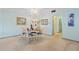 Light and airy dining area with a round table and chairs at 1403 Cordova Grn, Seminole, FL 33777