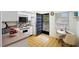 Bright kitchen with white cabinets and appliances at 1403 Cordova Grn, Seminole, FL 33777