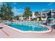 Refreshing community pool with plenty of space for lounging at 1403 Cordova Grn, Seminole, FL 33777