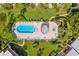 Inviting pool and spa area with ample lounge chairs for relaxation at 1403 Cordova Grn, Seminole, FL 33777