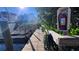 Community dock with fire extinguisher and hose at 1515 Pinellas Bayway S # 45, St Petersburg, FL 33715