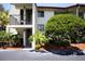 Building exterior showing entrance with landscaping at 1515 Pinellas Bayway S # 45, St Petersburg, FL 33715