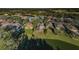 Aerial view of house and surrounding neighborhood at 1610 Brilliant Cut Way, Valrico, FL 33594