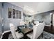 Formal dining room with a wine rack and stylish light fixture at 1610 Brilliant Cut Way, Valrico, FL 33594