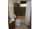 Clean bathroom with shower/tub combo and tiled walls at 2095 59Th N St, Clearwater, FL 33760