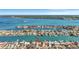 Aerial view of waterfront home with private dock and boat access at 219 Leeward Is, Clearwater Beach, FL 33767