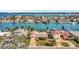 Stunning aerial view of waterfront home and neighborhood at 219 Leeward Is, Clearwater Beach, FL 33767