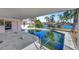 Large pool with covered patio and waterfront access at 219 Leeward Is, Clearwater Beach, FL 33767