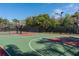 Dual basketball court with tennis area at 322 Ibisview Ln, Apollo Beach, FL 33572