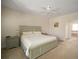 Primary bedroom with king bed and access to bathroom at 322 Ibisview Ln, Apollo Beach, FL 33572
