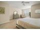 Large Primary bedroom with king bed and sitting area at 322 Ibisview Ln, Apollo Beach, FL 33572