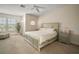 Spacious Primary bedroom with king-size bed and ceiling fan at 322 Ibisview Ln, Apollo Beach, FL 33572
